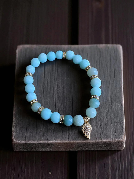 Amazonite crystal bracelet with blue-green gemstone beads for calm and balance.
