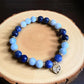 Aquamarine and sodalite gemstone bracelet for calm, truth, and intuition.