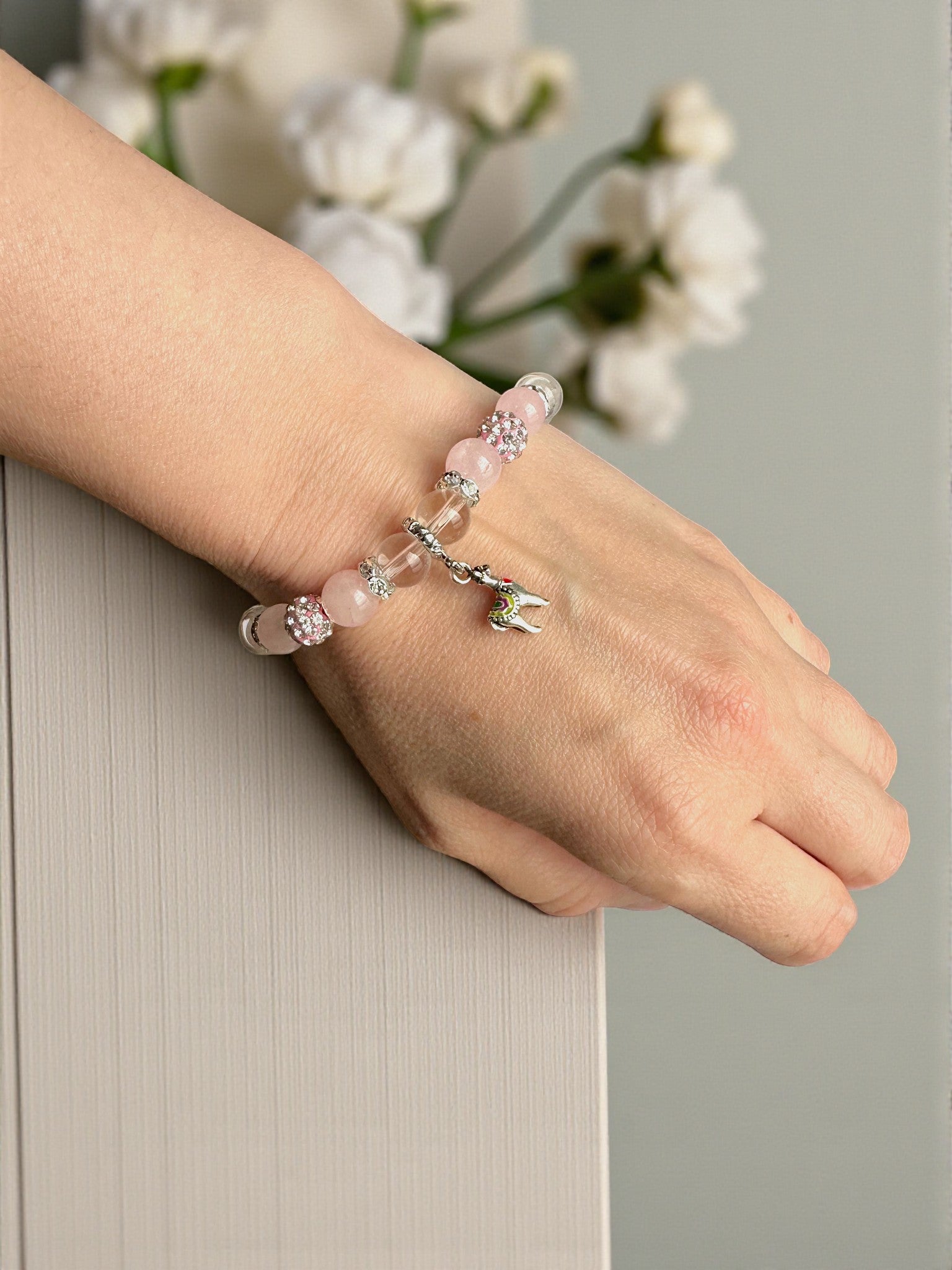 Beaded gemstone bracelet combining rose quartz and clear quartz