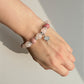 Beaded gemstone bracelet symbolising compassion and forgiveness