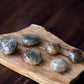 Black moonstone palm stones