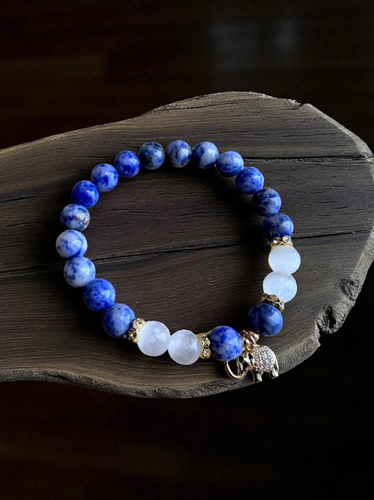 Blue spot jasper and selenite gemstone bracelet for calm and cleansing.