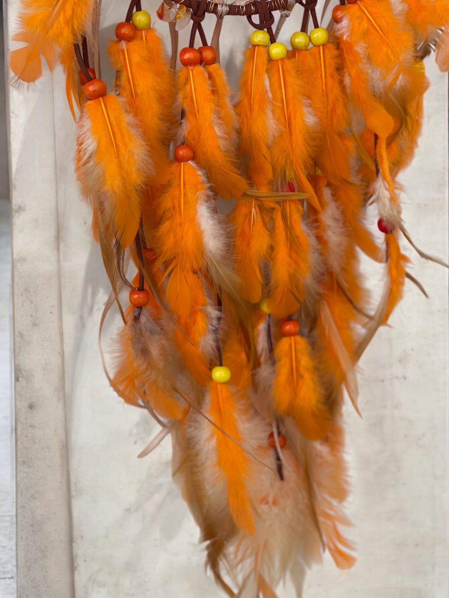 Carnelian crystal dreamcatcher with feathers