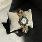 Citrine and Amber Custom Watch on a pillow