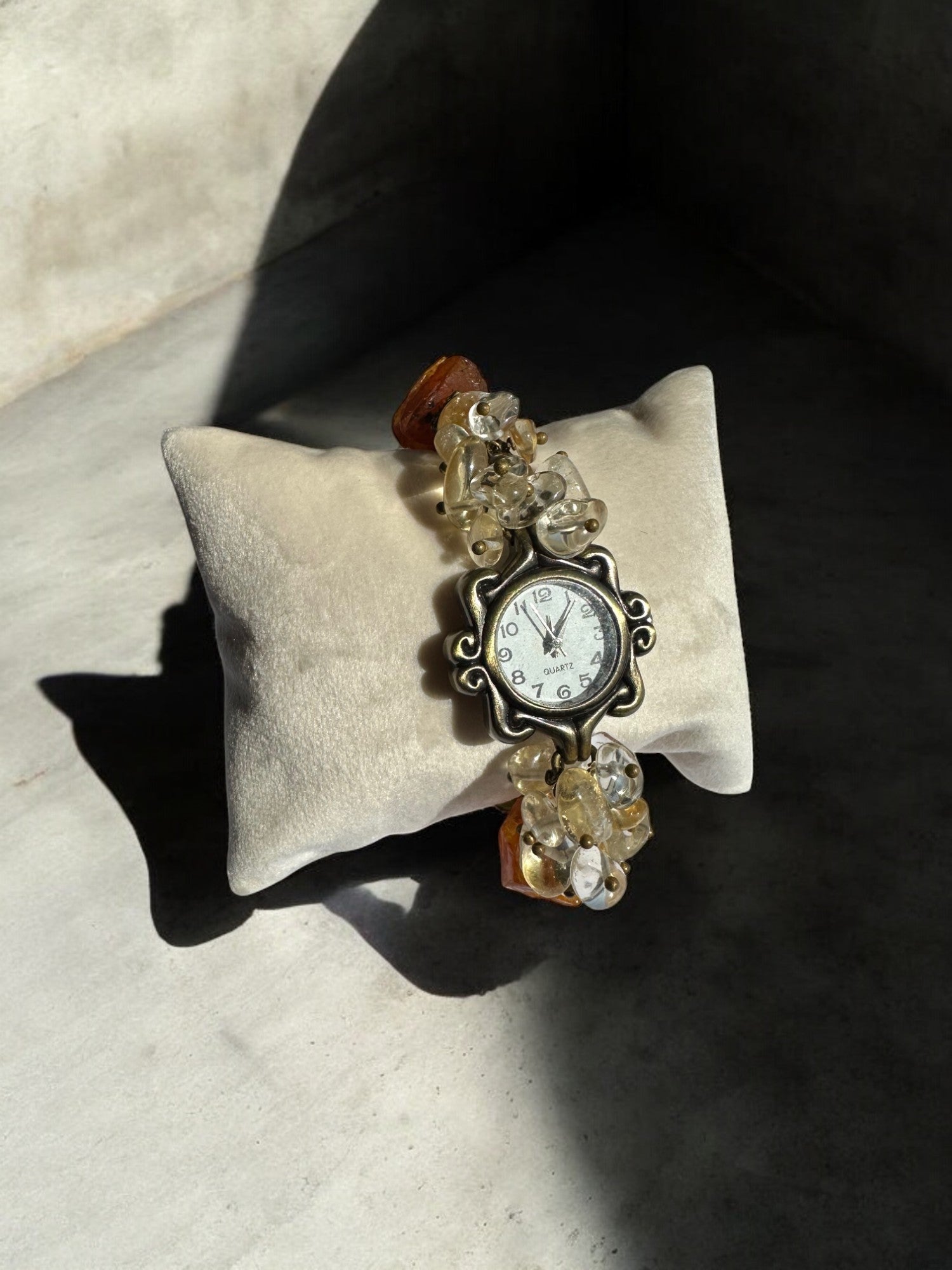 Citrine and Amber Custom Watch on a pillow