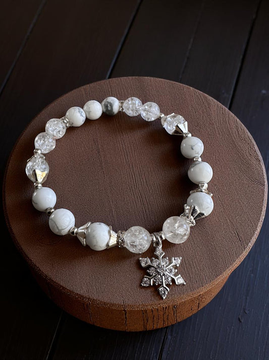 Clear quartz and howlite crystal bracelet with rhinestone snowflake charm
