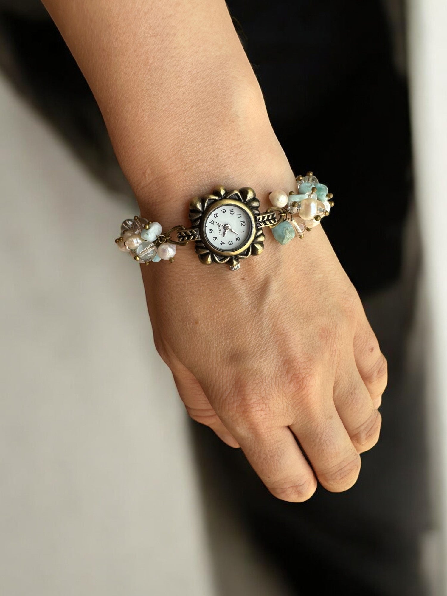 Closer view of Larimar, Pearl, and Clear Quartz Custom Watch