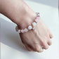 Crystal bracelet combining rose quartz and clear quartz for balance and compassion