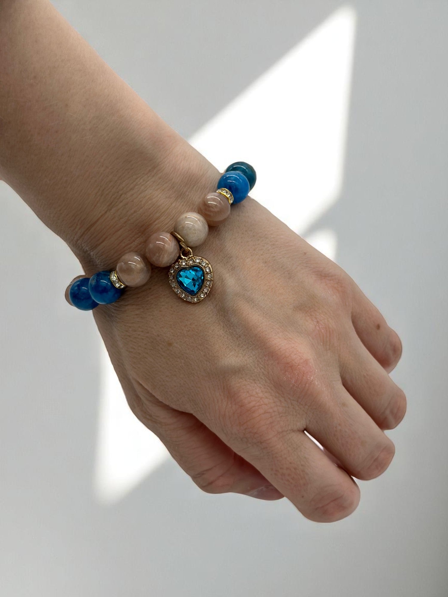 Crystal bracelet for solar plexus and throat chakra alignment