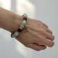 Crystal bracelet with earthy and blue tones for personal growth