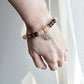 Crystal jewellery Australia featuring a pink aventurine and smoky quartz bracelet.