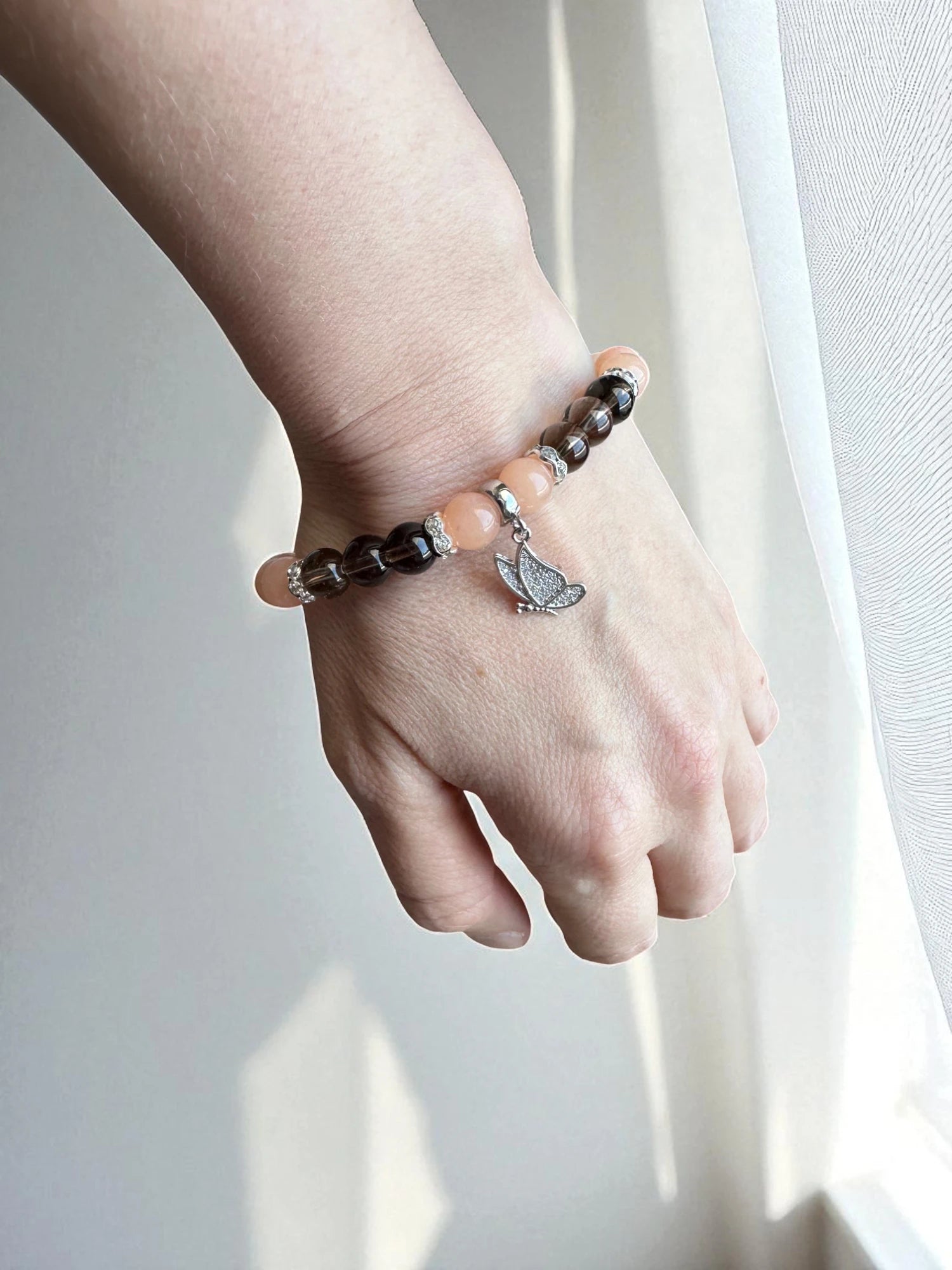 Crystal jewellery Australia featuring a pink aventurine and smoky quartz bracelet.