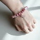 Crystal jewellery Australia featuring a rhodonite and pink opal bracelet