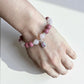 Crystal jewellery Australia featuring a rhodonite and rose quartz bracele