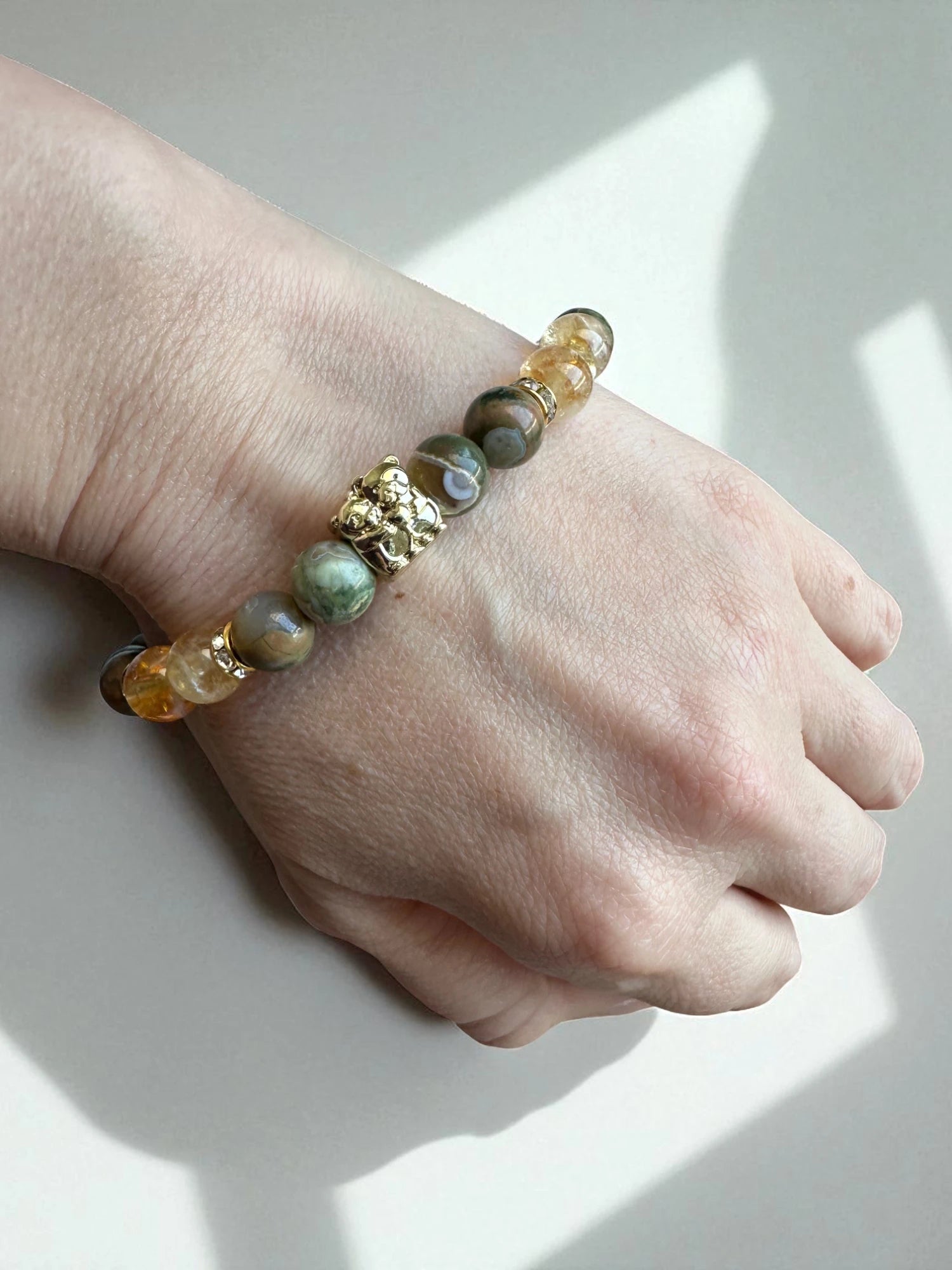 Crystal jewellery Australia featuring a rhyolite and citrine bracelet.