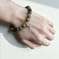 Crystal jewellery Australia featuring a unakite and golden sheen obsidian bracelet.