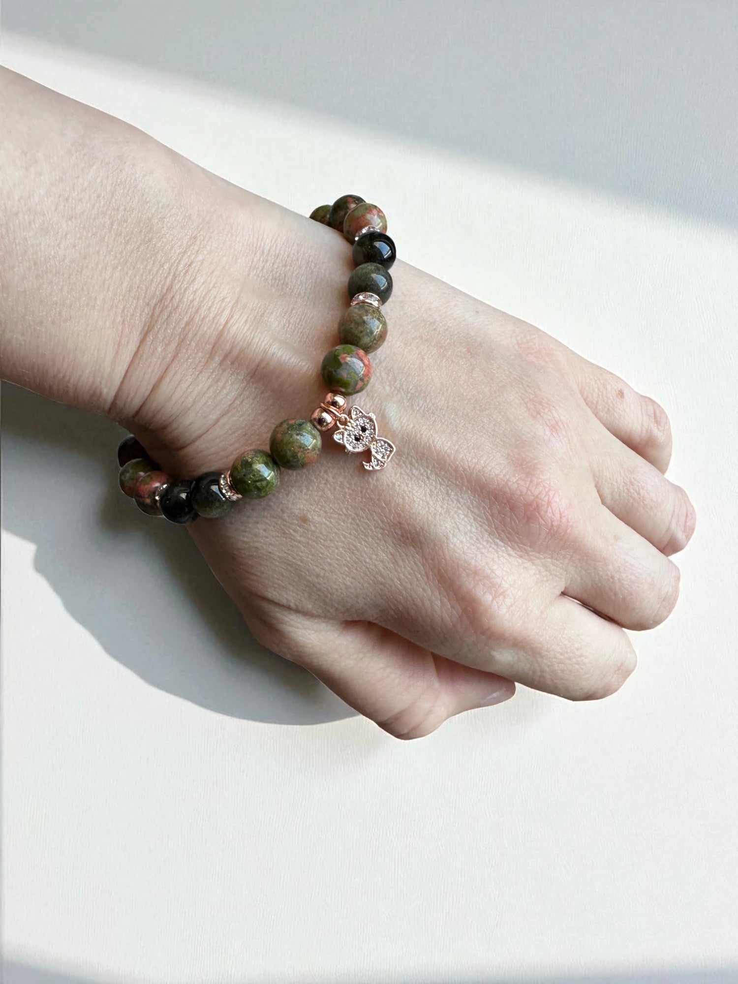 Crystal jewellery Australia featuring a unakite and golden sheen obsidian bracelet.