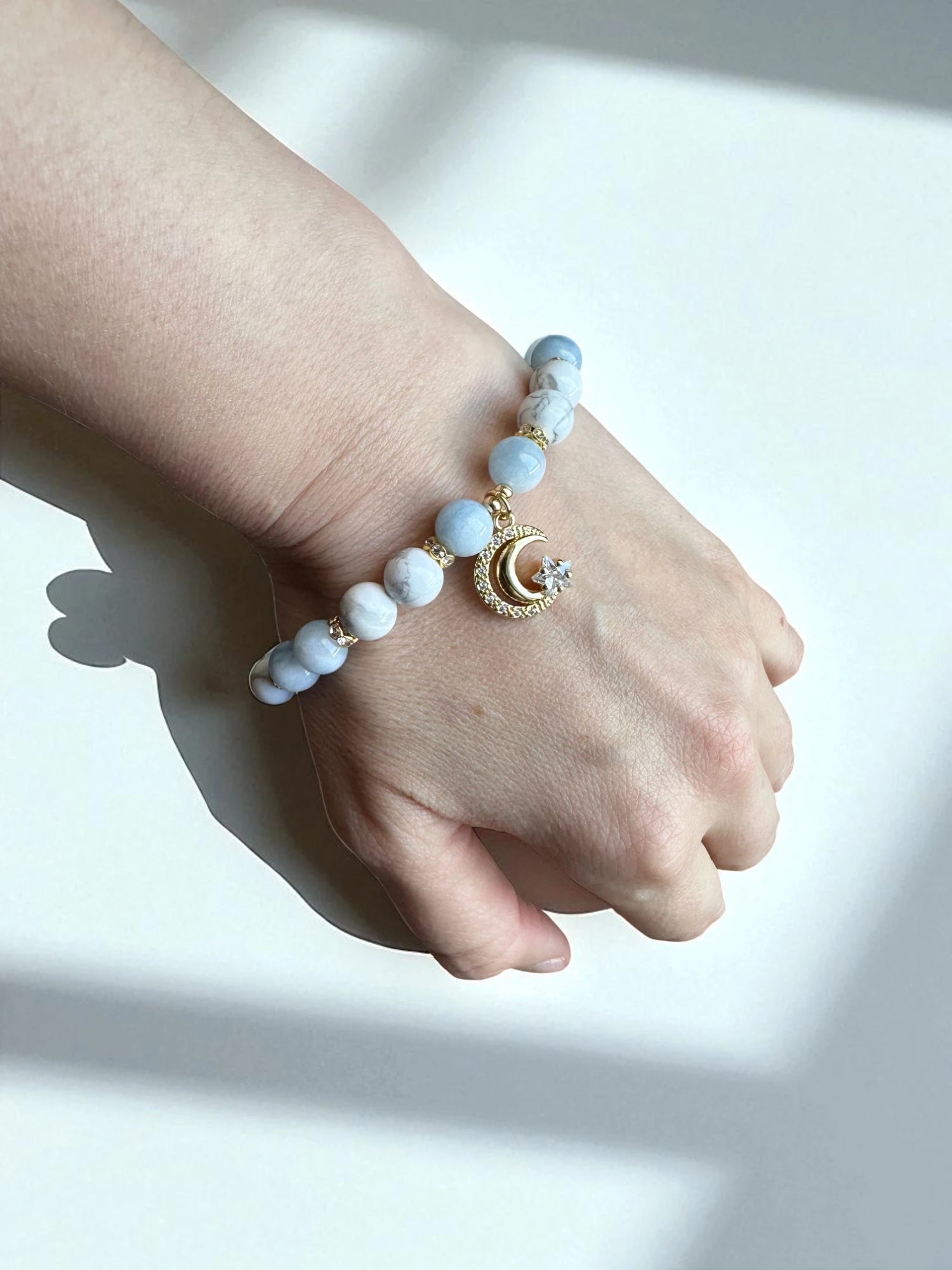 Crystal jewellery Australia featuring an aquamarine and howlite bracelet.