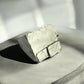 Detailed Pyrite cubes on a rocky base
