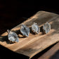 Druzy agate leaf crystal pendants on a slab