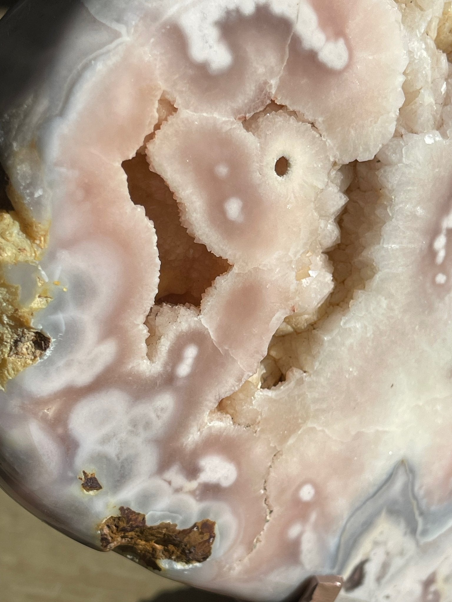 Giant pink amethyst crystal heart close up druzy