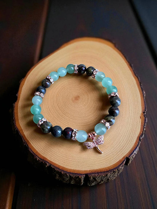 Green aventurine and dragon bloodstone gemstone bracelet for luck and strength.