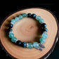 Green aventurine and kambaba jasper gemstone bracelet for growth and peace.
