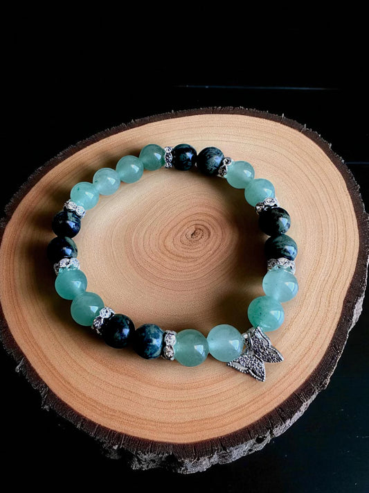 Green aventurine and kambaba jasper gemstone bracelet for growth and peace.