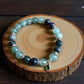 Green aventurine and moss agate gemstone bracelet for renewal and balance.