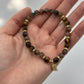 Grounding crystal bracelet with brown and earthy tones, handcrafted