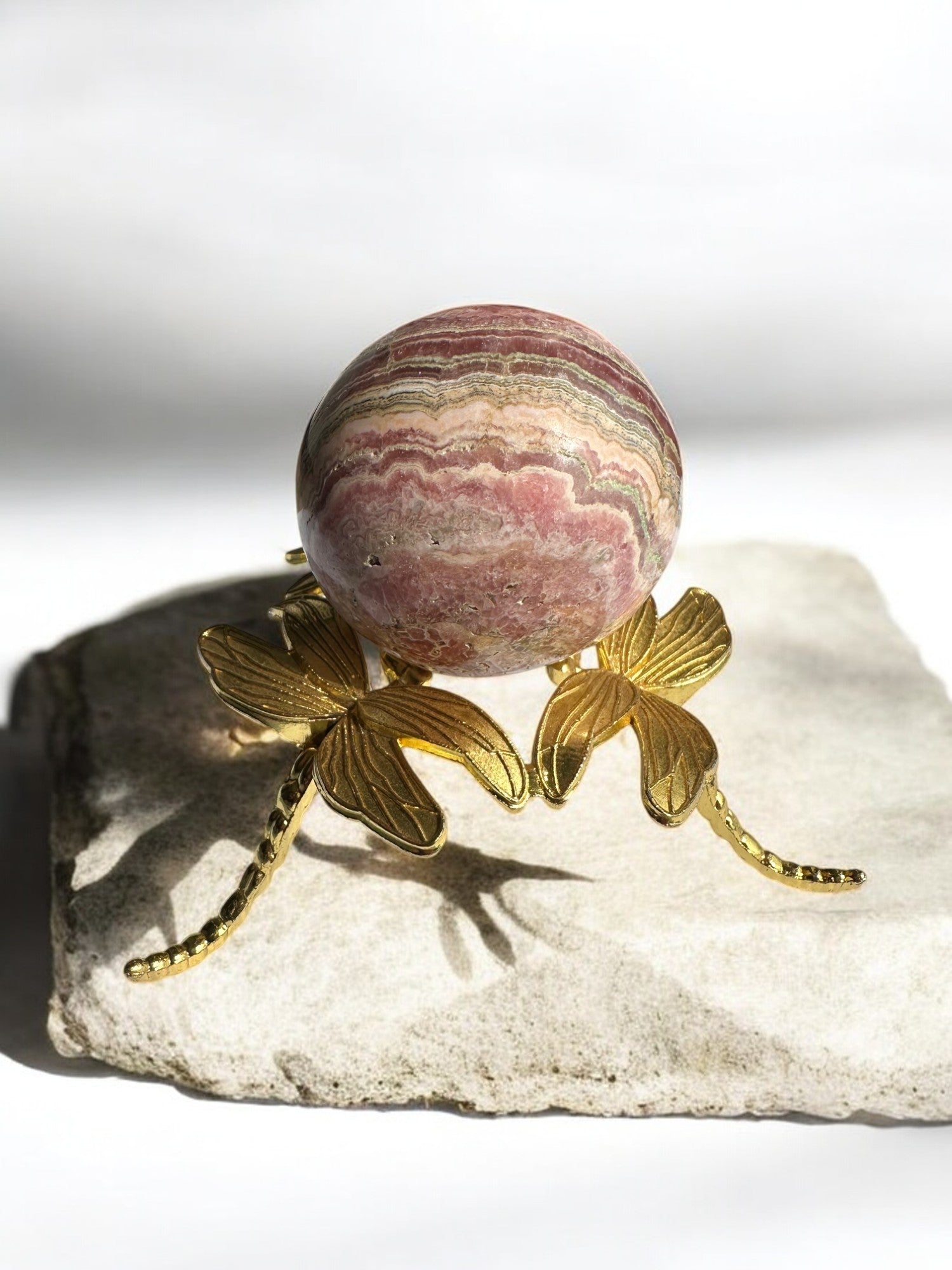 Hand-carved Rhodochrosite crystal ball from Argentina