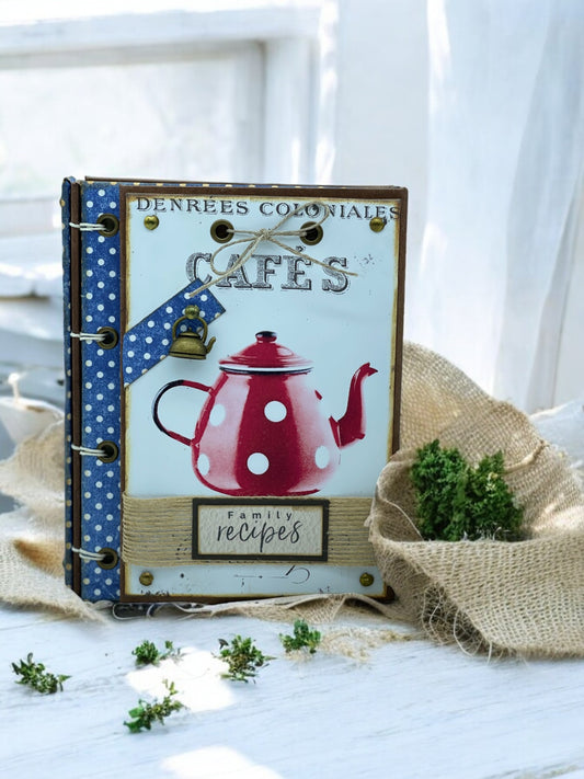 Handmade A6 blue polka dot recipe book with 80 recycled pages, pocket, 8 bookmarks and magnetic flap—customisable cookbook for family recipes.