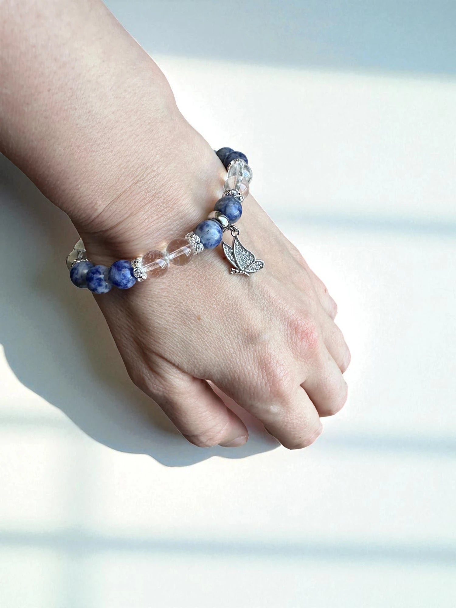 Handmade crystal bracelet with blue spot jasper and clear quartz beads