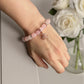Handmade pink gemstone bracelet promoting compassion and self-love