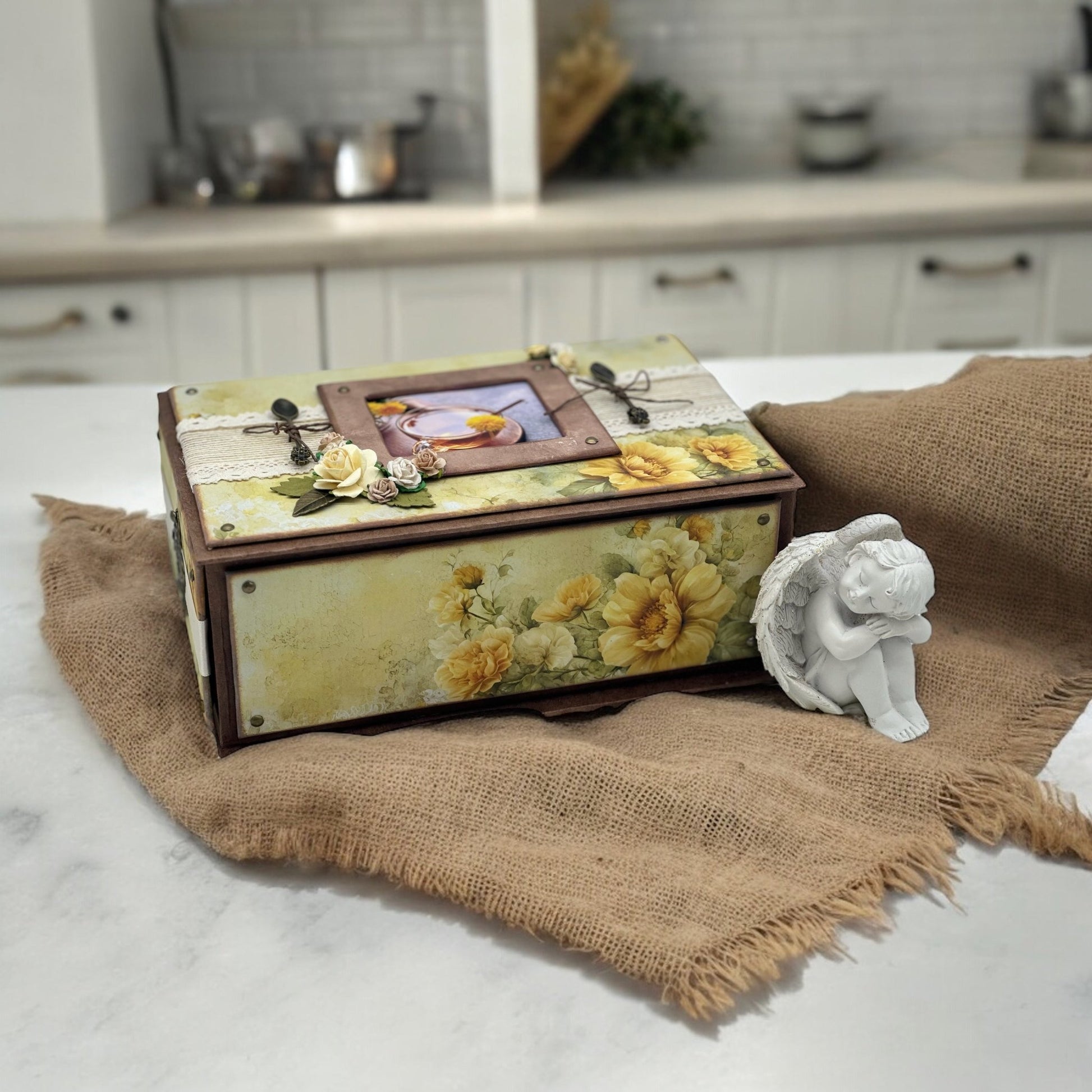 Handmade shabby chic yellow daffodil tea box with four compartments, bronze chain lid and side handles—artisan tea organiser chest for tea bags and blends