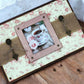 Handmade vintage pink rose shabby chic tea box with four compartments, bronze chain lid and handles—artisan tea organiser chest for storing tea bags.