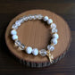 Howlite and clear quartz gemstone bracelet for calm and clarity.
