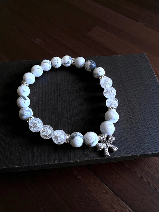 Howlite and clear quartz gemstone bracelet for peace and balance.