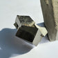 Metallic Pyrite cluster highlighting cubic geometry
