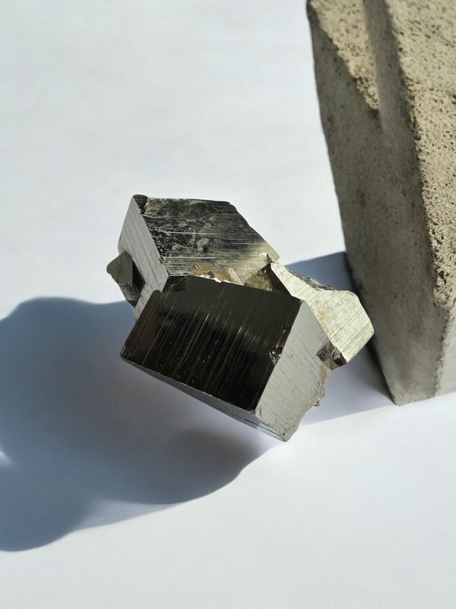 Metallic Pyrite cluster highlighting cubic geometry