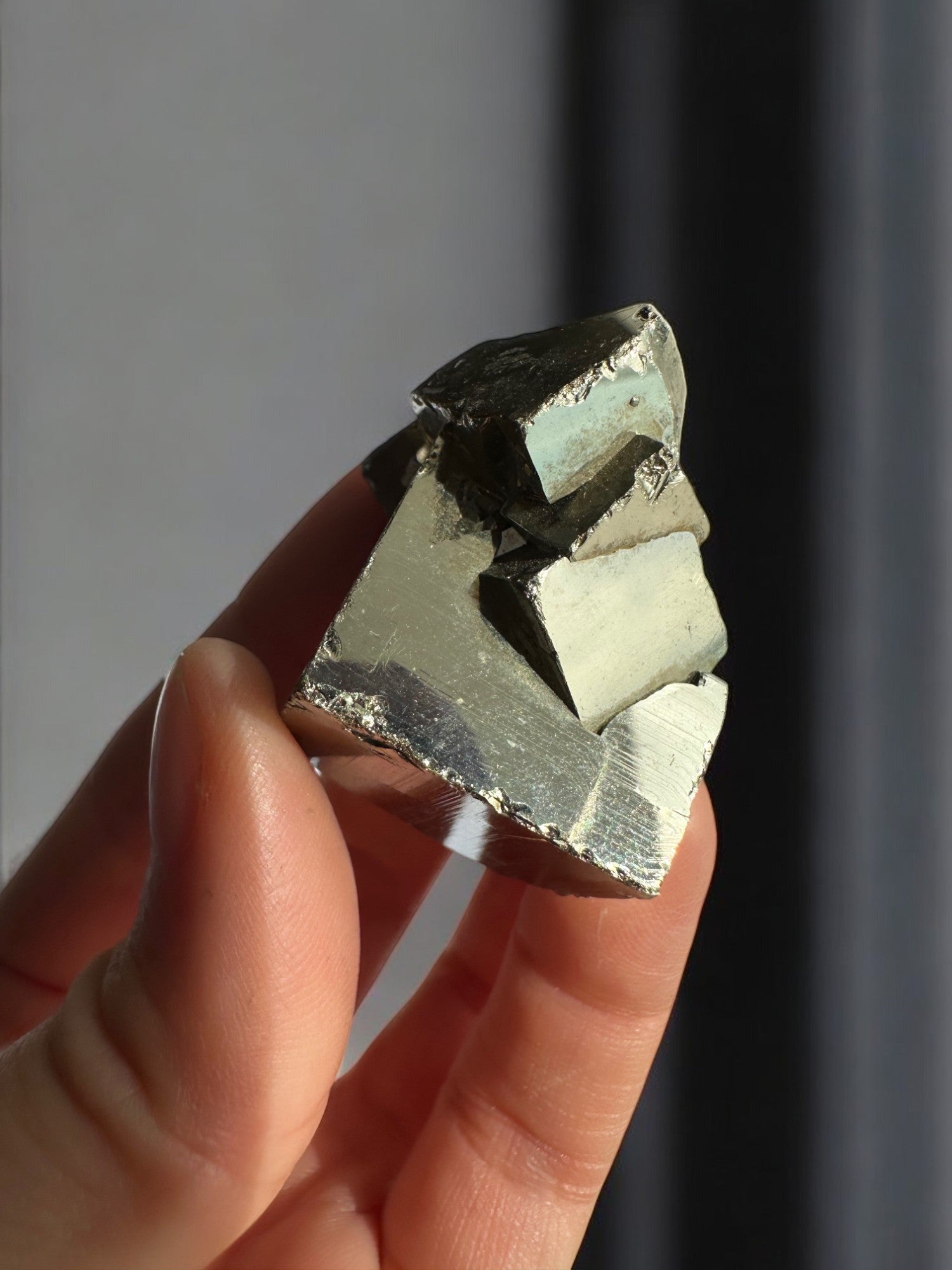 Multiple cubes on a pyrite raw crystal