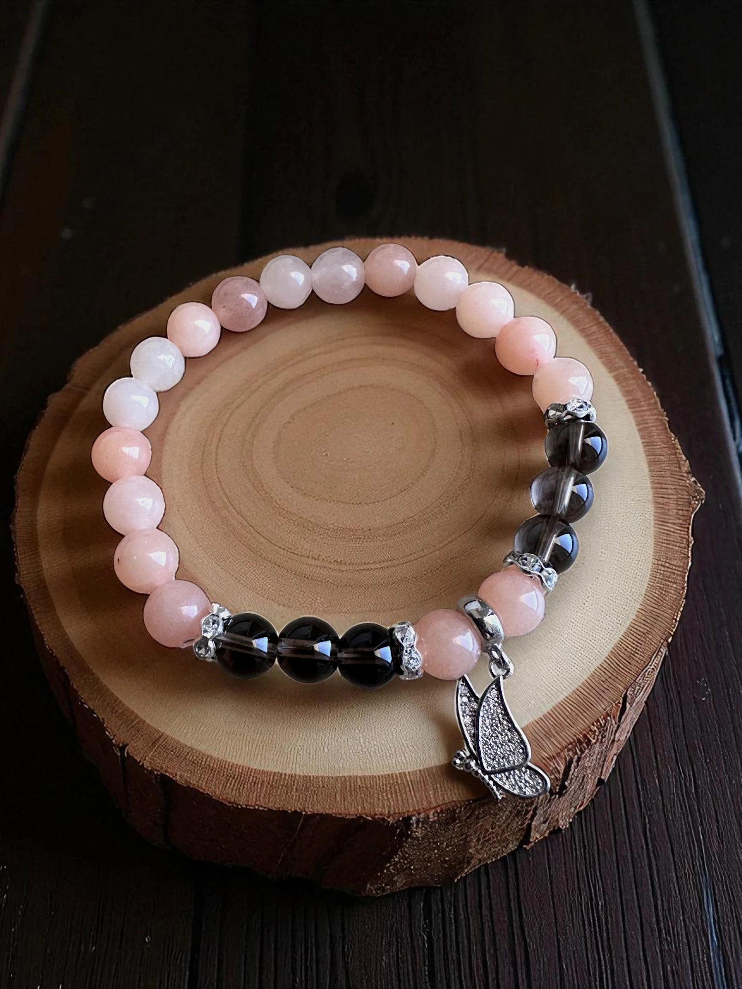 Pink aventurine and smoky quartz gemstone bracelet for balance and protection.