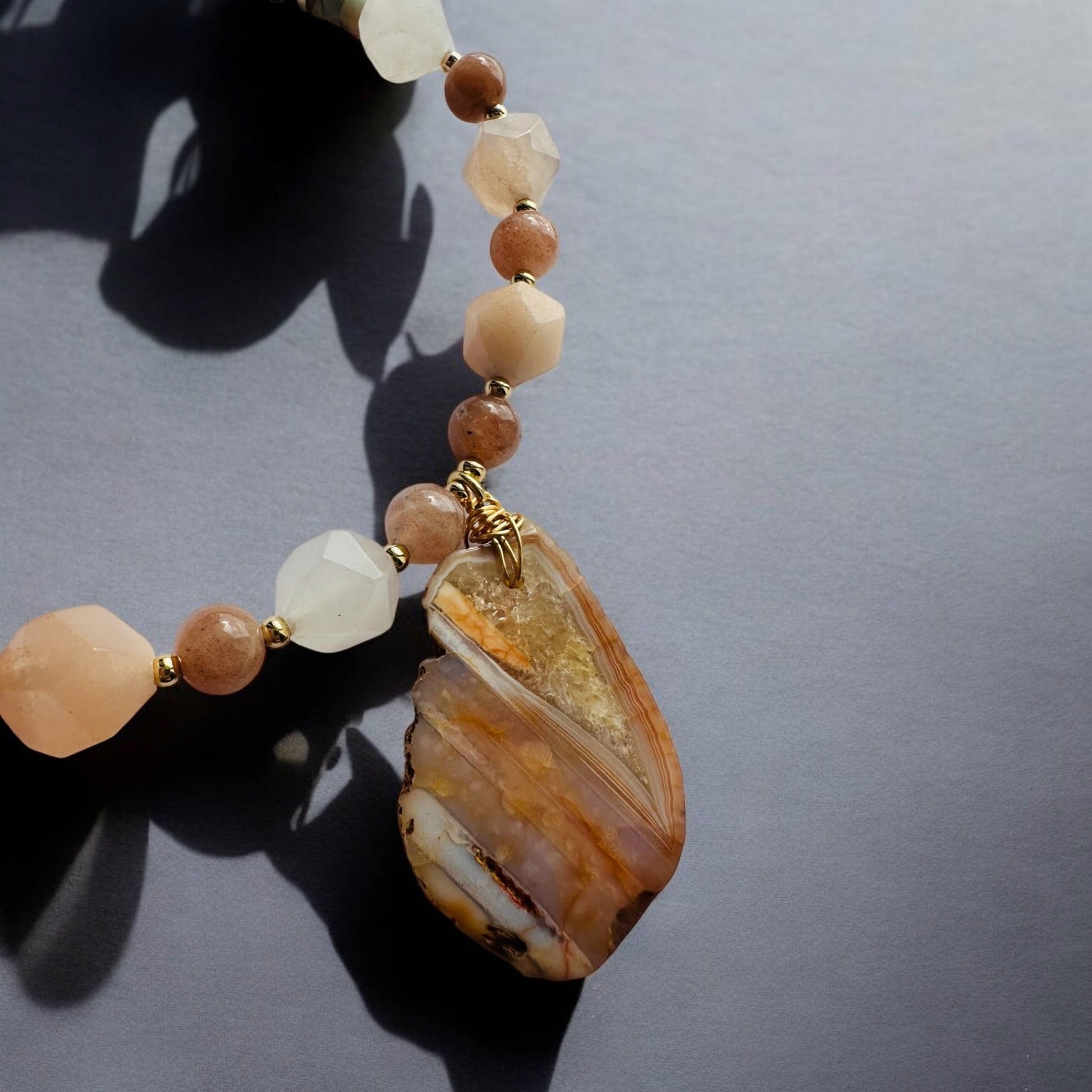 Pink aventurine, sun stone, jasper and solar quartz crystal necklace