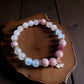 Pink opal, rose quartz, and opalite bracelet with swan charms