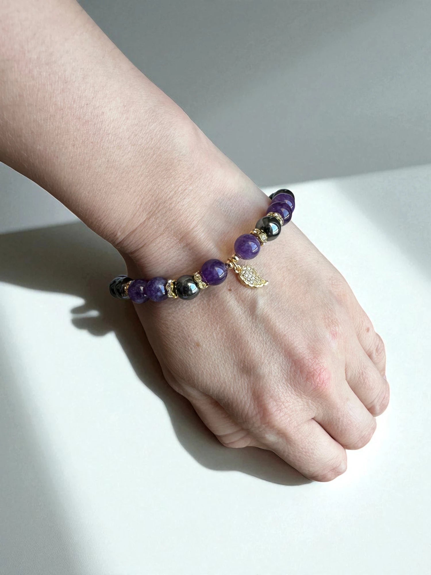 Protective amethyst and hematite beaded bracelet for strength and balance