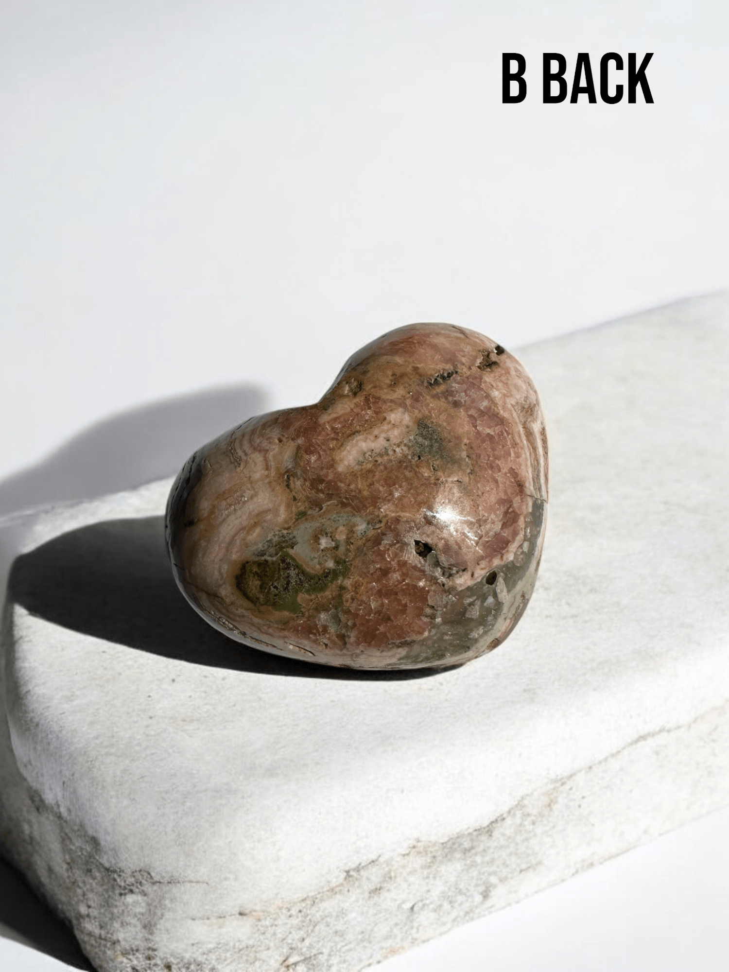 Rare Rhodochrosite heart with a glossy finish from Argentina