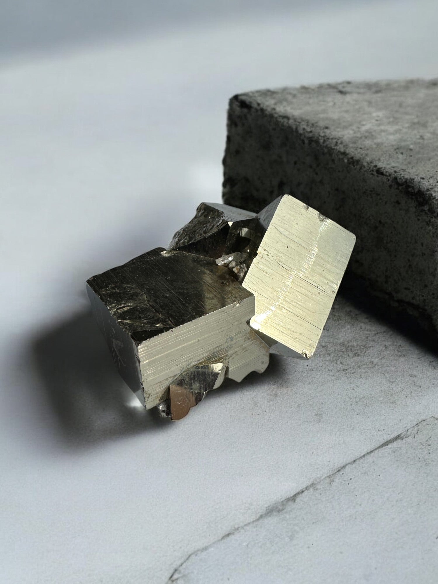 Raw Pyrite cube structure with golden finish