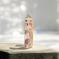 Rhodochrosite crystal point back view