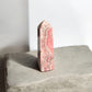 Rhodochrosite crystal tower on a slab