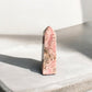 Rhodochrosite crystal tower with lighter colours